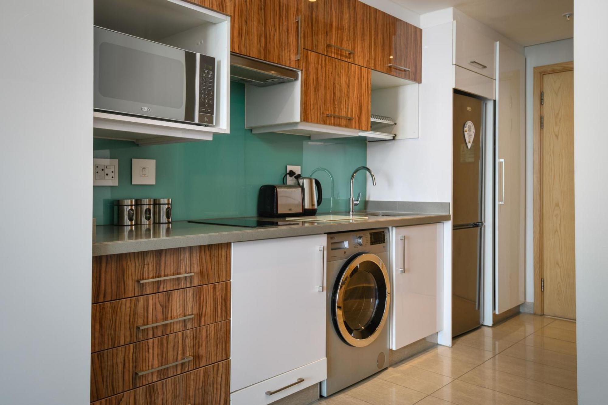 The Capital Pearls Hotel Дурбан Экстерьер фото A typical kitchen in a serviced apartment